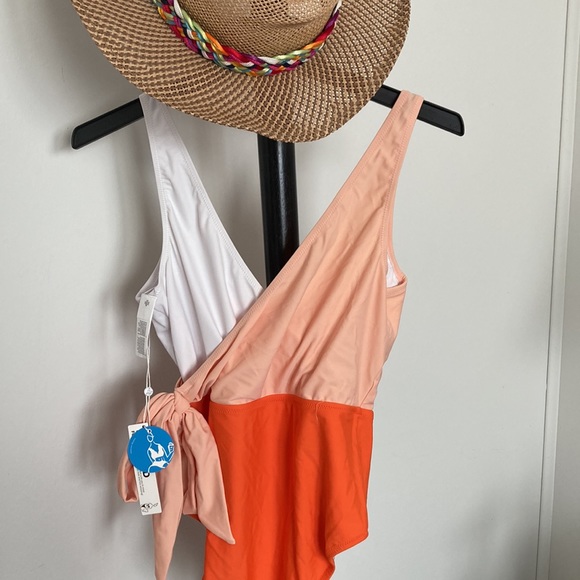 Orange brand new swimsuit. - Picture 2 of 5